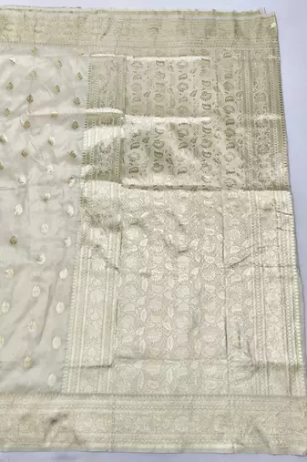 Cream zari woven silk blend saree with blouse piece