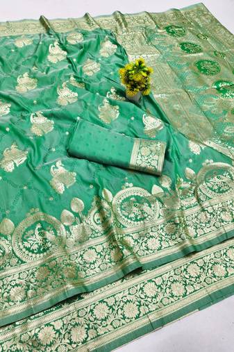 Green zari woven banarasi silk blend saree with blouse piece