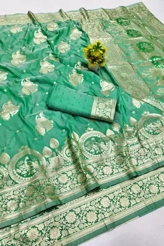 Green zari woven banarasi silk blend saree with blouse piece