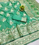 Green zari woven banarasi silk blend saree with blouse piece