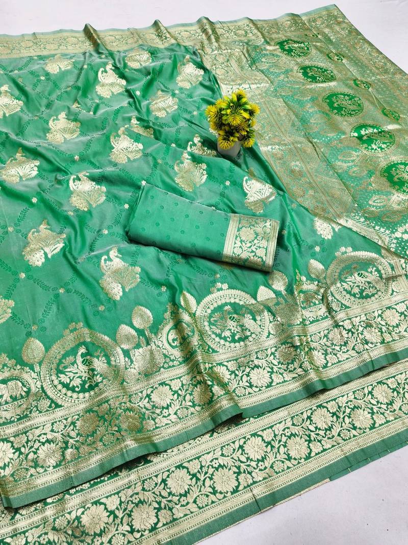 Green zari woven banarasi silk blend saree with blouse piece