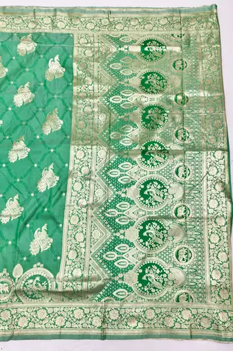 Green zari woven silk blend saree with blouse piece