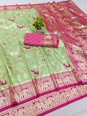 Light green zari woven silk blend saree with blouse piece 1