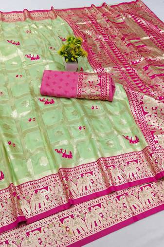 Light green zari woven banarasi silk blend saree with blouse piece