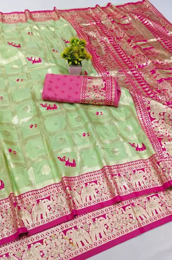 Light green zari woven banarasi silk blend saree with blouse piece