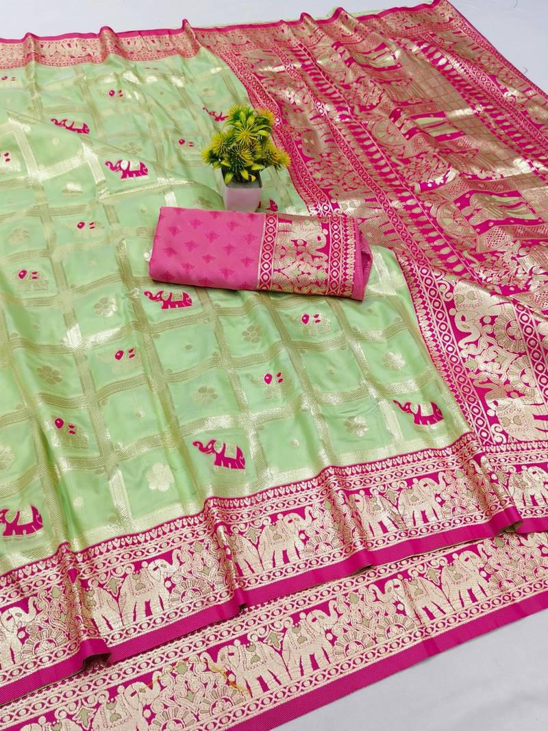 Light green zari woven banarasi silk blend saree with blouse piece