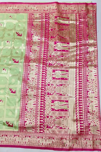 Light green zari woven silk blend saree with blouse piece