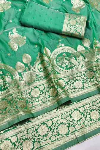 Green zari woven silk blend saree with blouse piece
