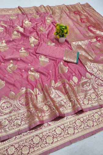 Pink zari woven banarasi silk blend saree with blouse piece