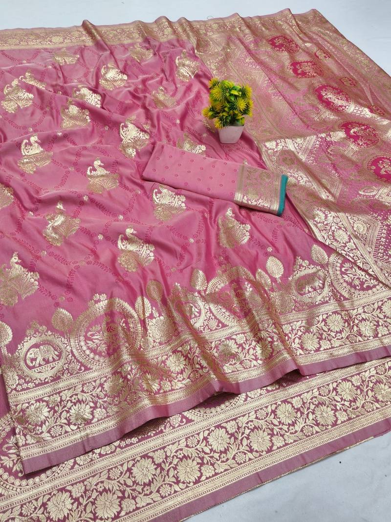 Pink zari woven banarasi silk blend saree with blouse piece