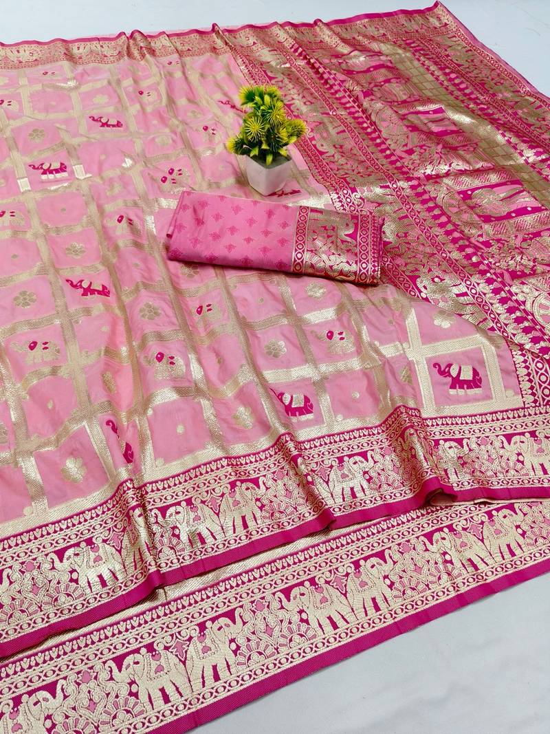 Pink zari woven banarasi silk blend saree with blouse piece
