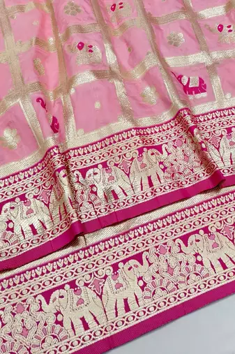 Pink zari woven silk blend saree with blouse piece