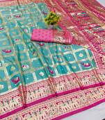 Light blue zari woven banarasi silk blend saree with blouse piece