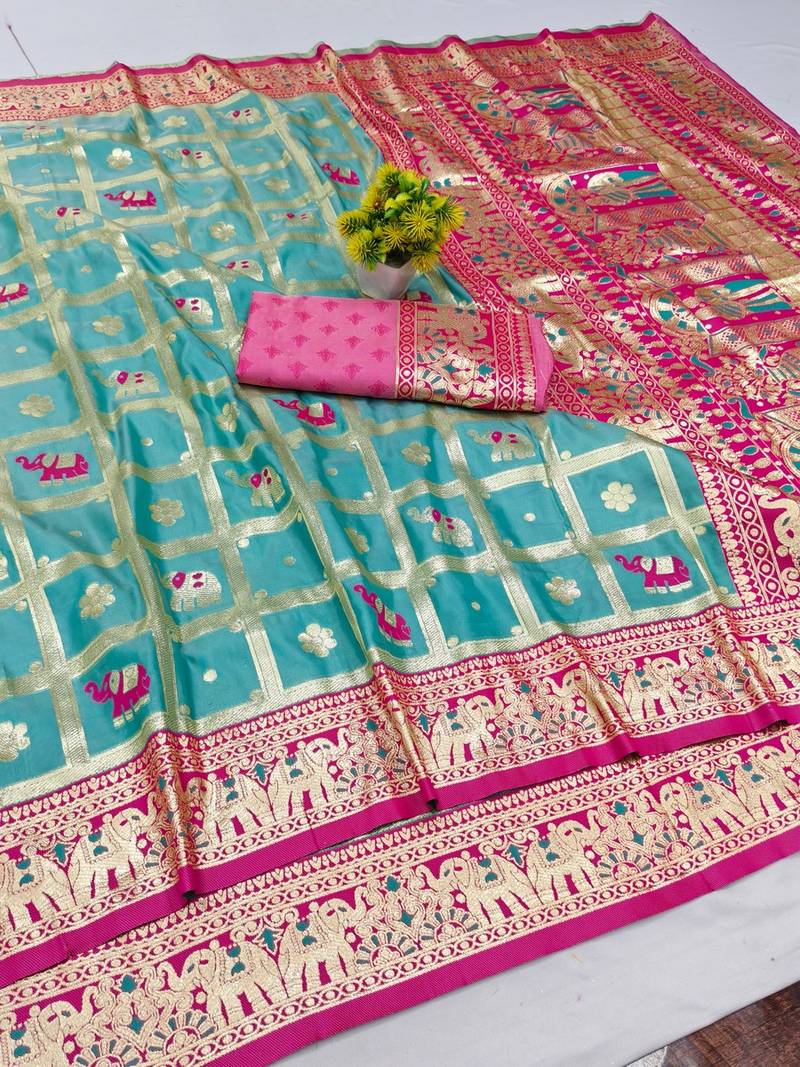 Light blue zari woven banarasi silk blend saree with blouse piece