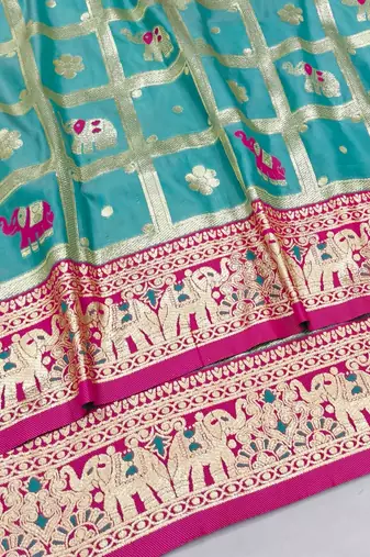 Light blue zari woven silk blend saree with blouse piece