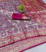 Magenta zari woven banarasi silk blend saree with blouse piece