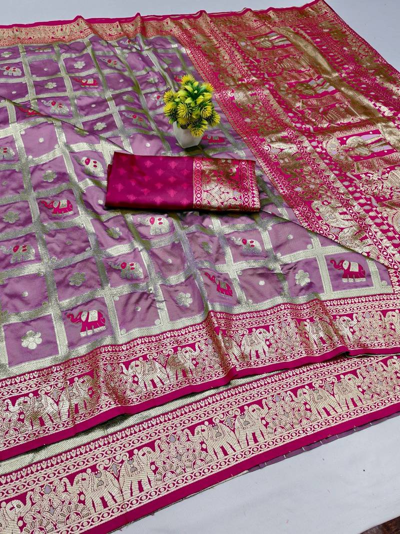 Magenta zari woven banarasi silk blend saree with blouse piece