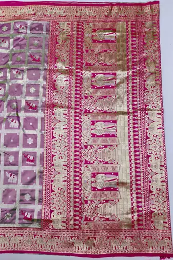 Magenta zari woven silk blend saree with blouse piece