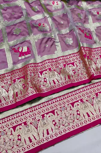 Magenta zari woven silk blend saree with blouse piece