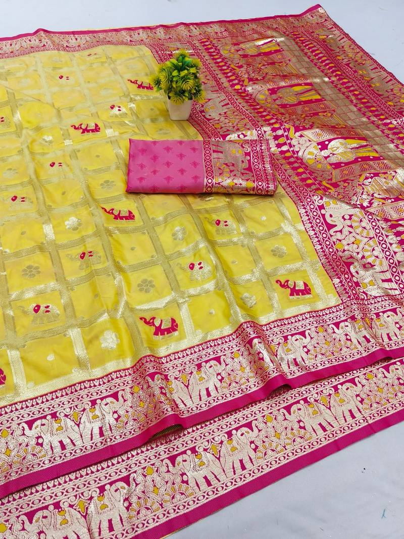 Yellow zari woven banarasi silk blend saree with blouse piece