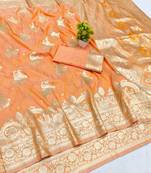 Orange zari woven banarasi silk blend saree with blouse piece
