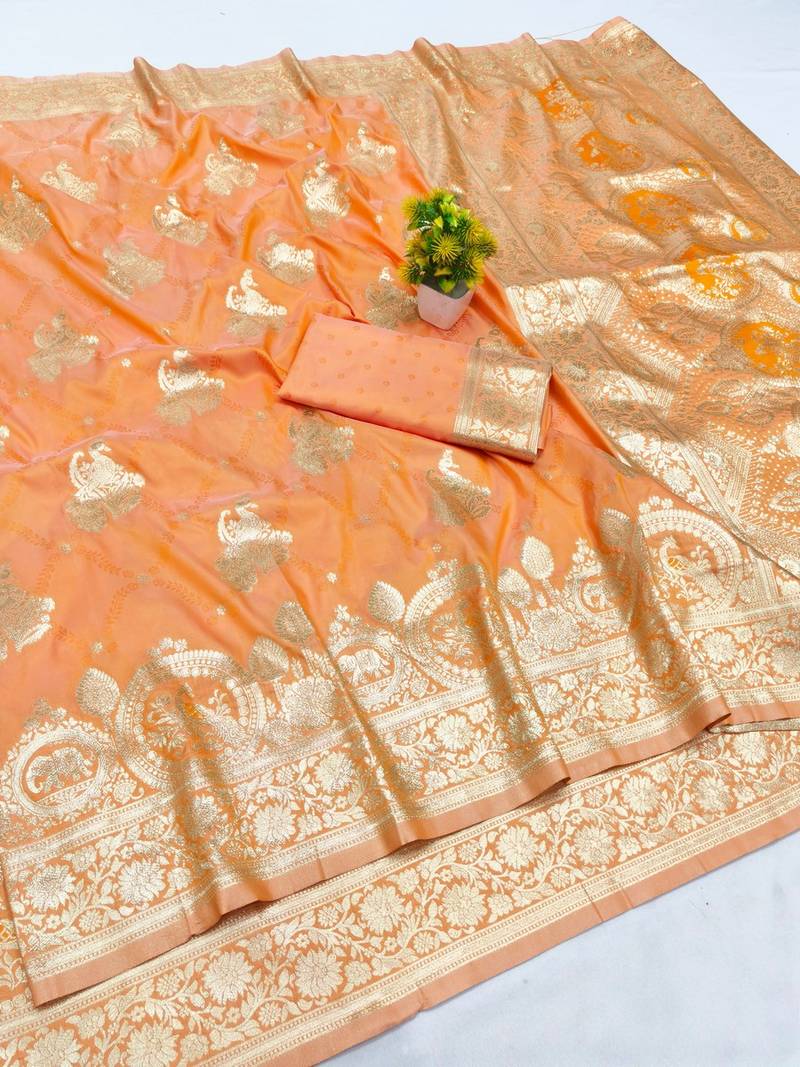 Orange zari woven banarasi silk blend saree with blouse piece