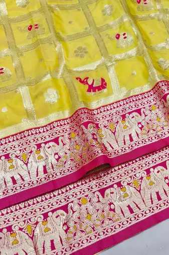 Yellow zari woven silk blend saree with blouse piece
