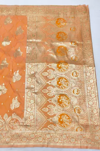 Orange zari woven silk blend saree with blouse piece