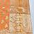 Orange zari woven banarasi silk blend saree with blouse piece