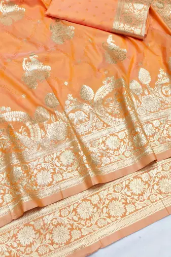 Orange zari woven silk blend saree with blouse piece