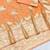 Orange zari woven banarasi silk blend saree with blouse piece
