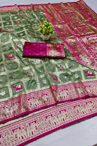 Pista green zari woven banarasi silk blend saree with blouse piece