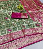 Pista green zari woven banarasi silk blend saree with blouse piece