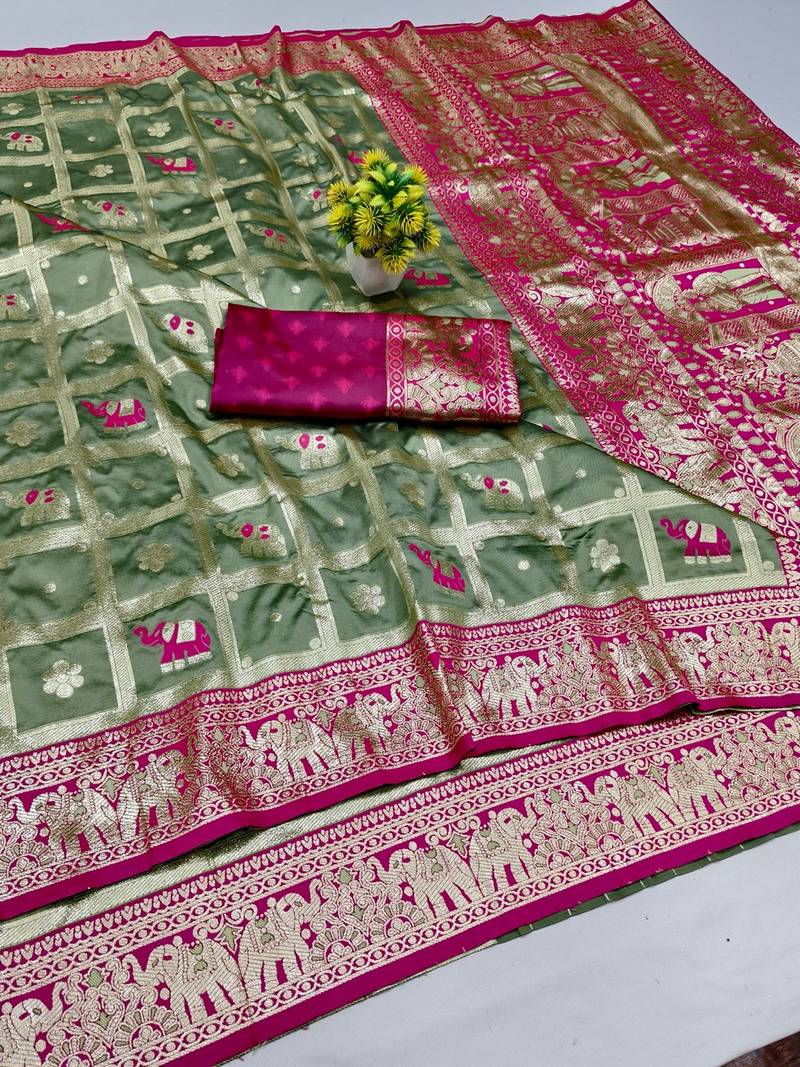 Pista green zari woven banarasi silk blend saree with blouse piece