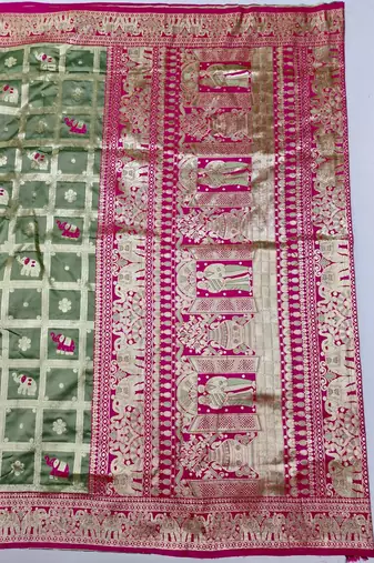 Pista green zari woven silk blend saree with blouse piece