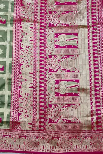 Pista green zari woven silk blend saree with blouse piece