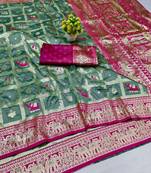 Teal blue zari woven banarasi silk blend saree with blouse piece