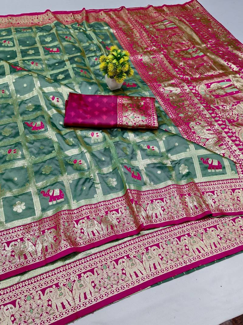 Teal blue zari woven banarasi silk blend saree with blouse piece