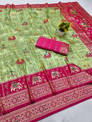 Light green zari woven patola silk blend saree with blouse piece 1