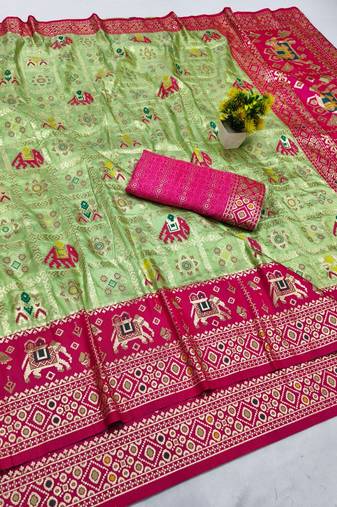Light green zari woven patola silk blend saree with blouse piece