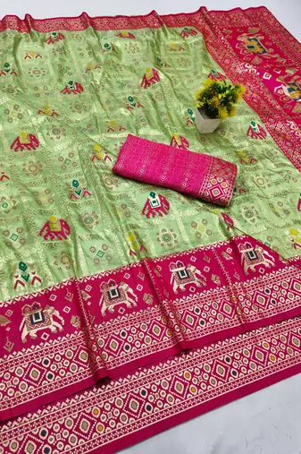 Light green zari woven patola silk blend saree with blouse piece