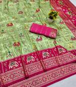 Light green zari woven patola silk blend saree with blouse piece