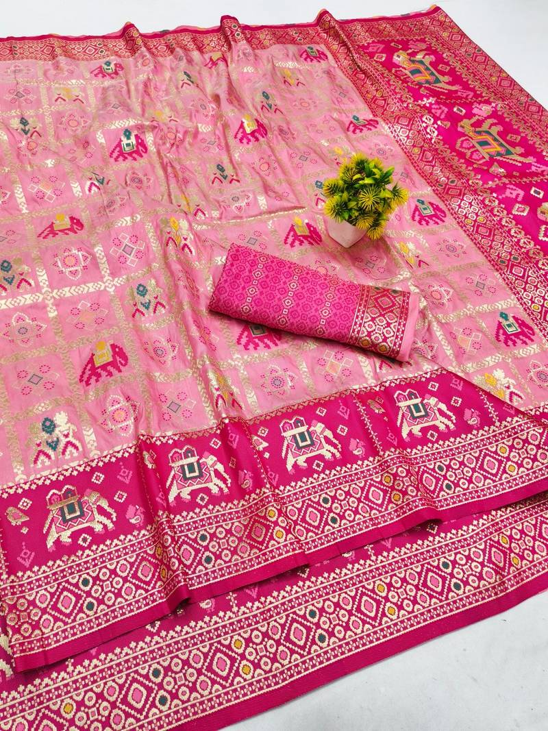Pink zari woven patola silk blend saree with blouse piece