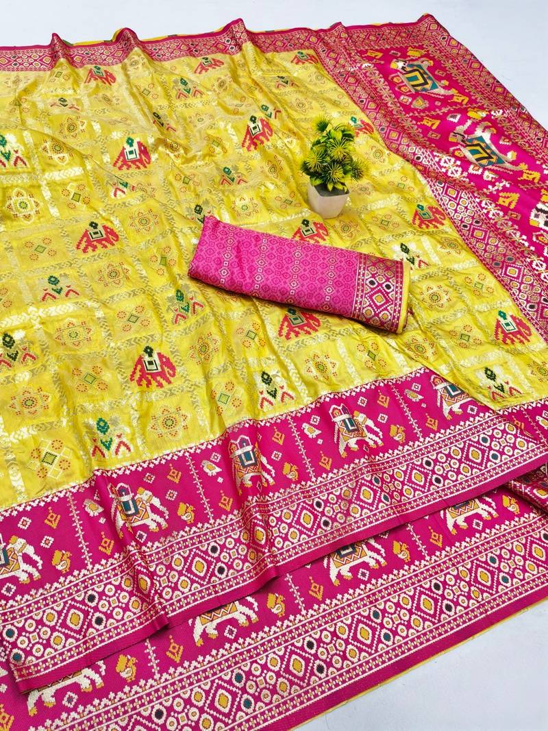 Gold zari woven patola silk blend saree with blouse piece