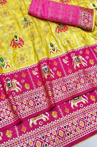 Gold zari woven patola silk blend saree with blouse piece
