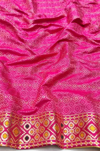 Gold zari woven patola silk blend saree with blouse piece