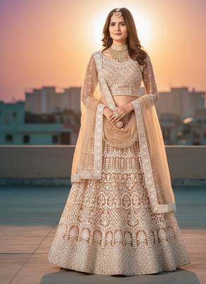 Women's Peach Net Embroidered Semi-Stiched Lehenga With Unstiched Choli And Net Dupatta 1