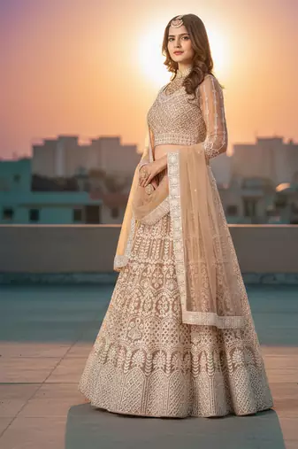 Women's Peach Net Embroidered Semi-Stiched Lehenga With Unstiched Choli And Net Dupatta