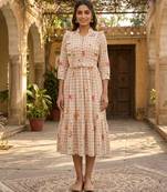 Beige color muslin printed stylish kurti