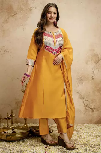 Yellow color chanderi partywear readymade salwar kameez for graceful looks